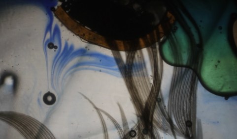 Detalle de un espectáculo de proyección de líquidos y creación de imágenes de Alexplays.