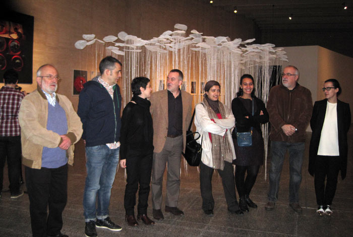 Foto de familia de los comisarios, el director del Musac y algunas artistas africanas participantes.